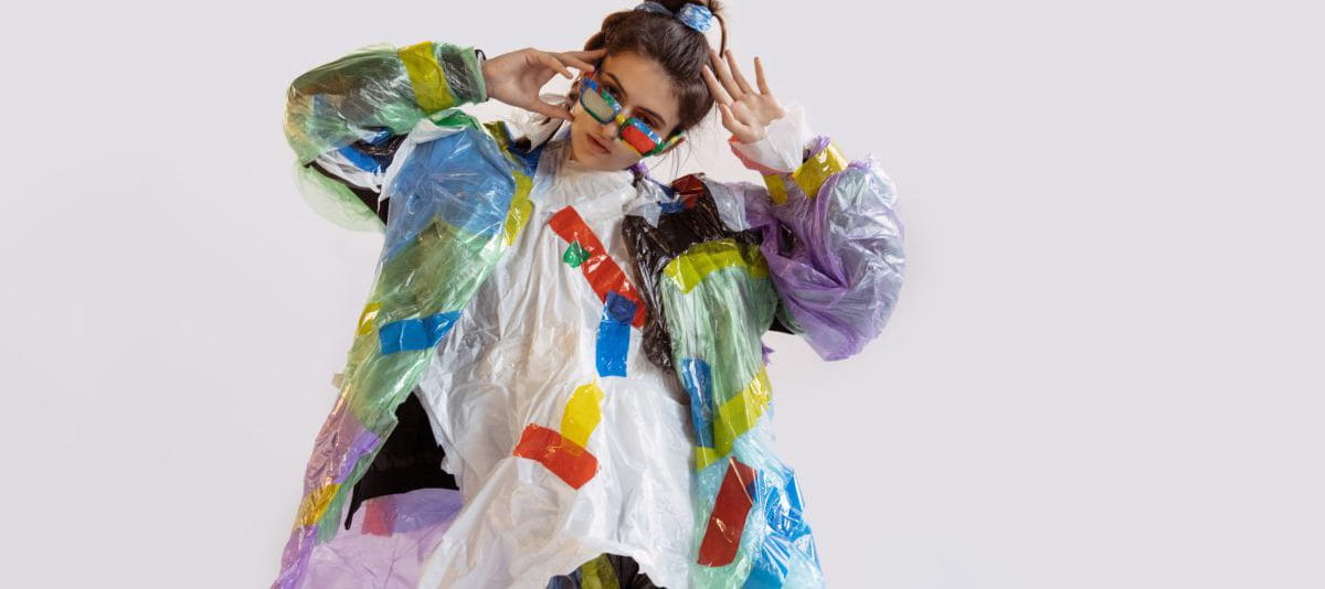 Woman,Wearing,Plastic,On,White,Background.,Female,Model,In,Clothes Woman,Wearing,Plastic,On,White,Background.,Female,Model,In,Clothes