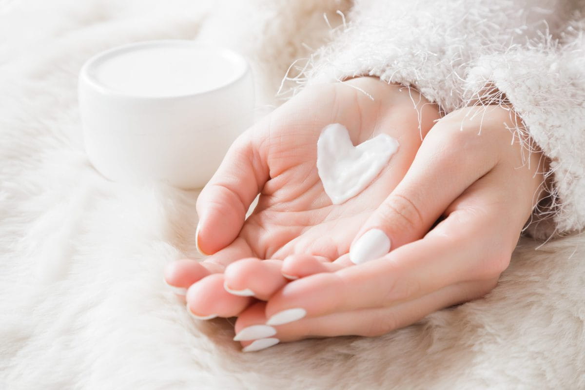 Beautiful,Groomed,Woman’s,Hands,With,Cream,Jar,On,The,Fluffy